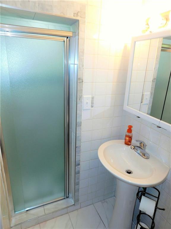 63 Beaver Grade Road McKees Rocks, PA 15136 - Photo 18 of 25 Renovated full bath in the lower level!