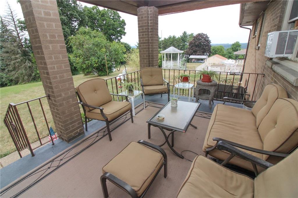 63 Beaver Grade Road McKees Rocks, PA 15136 - Photo 22 of 25 Rear Porch overlooks the spacious rear yard!