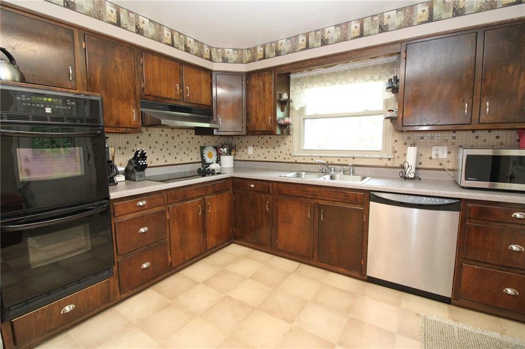 63 Beaver Grade Road McKees Rocks, PA 15136 - Photo 6 of 25 Kitchen with double ovens and electric cook top!