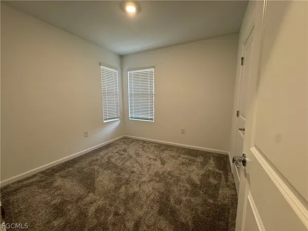 a view of room that has a fireplace