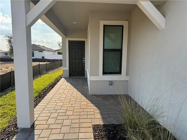a view of swimming pool from a balcony