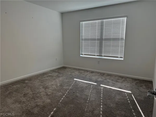 a view of a room with a window