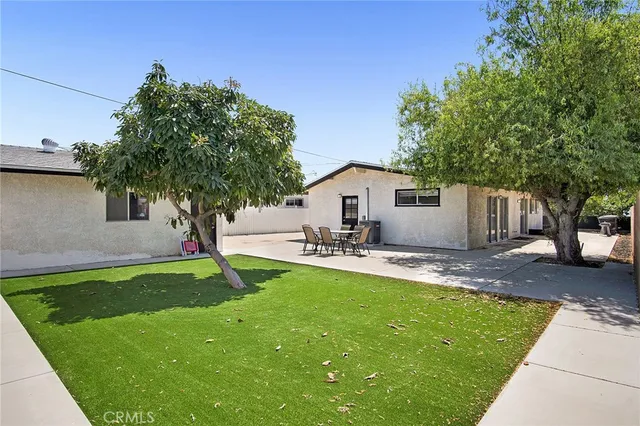 a house view with a garden space