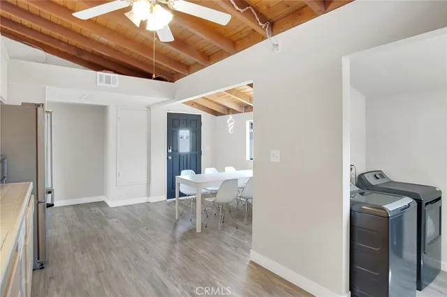 a view of entryway with wooden floor