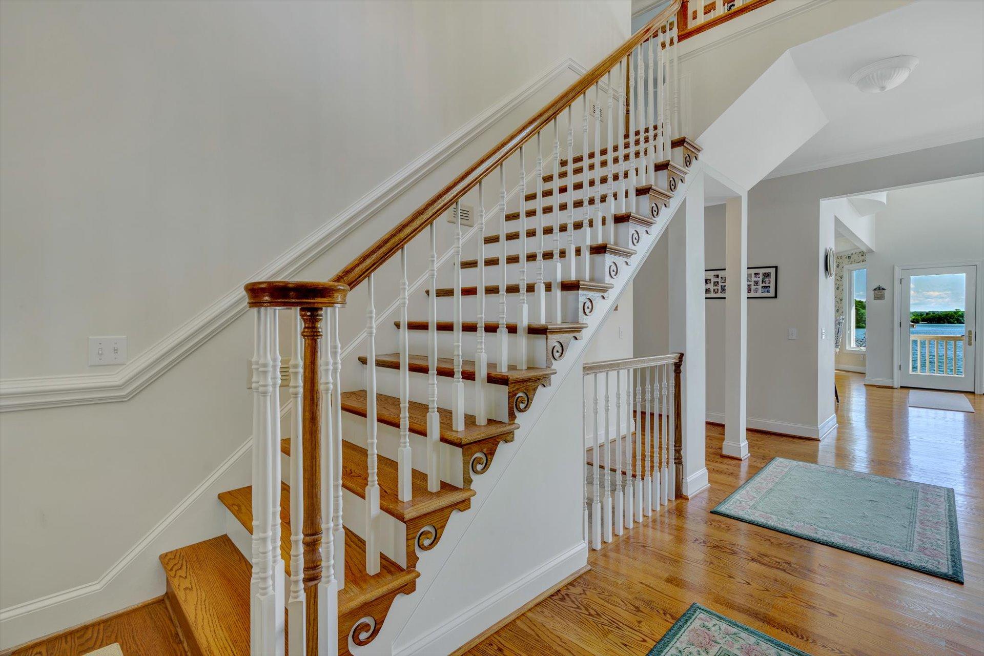 910 Somerset Cove Road Union Hall, VA 24176 - Photo 12 of 84 a view of entryway with wooden floor and stairs