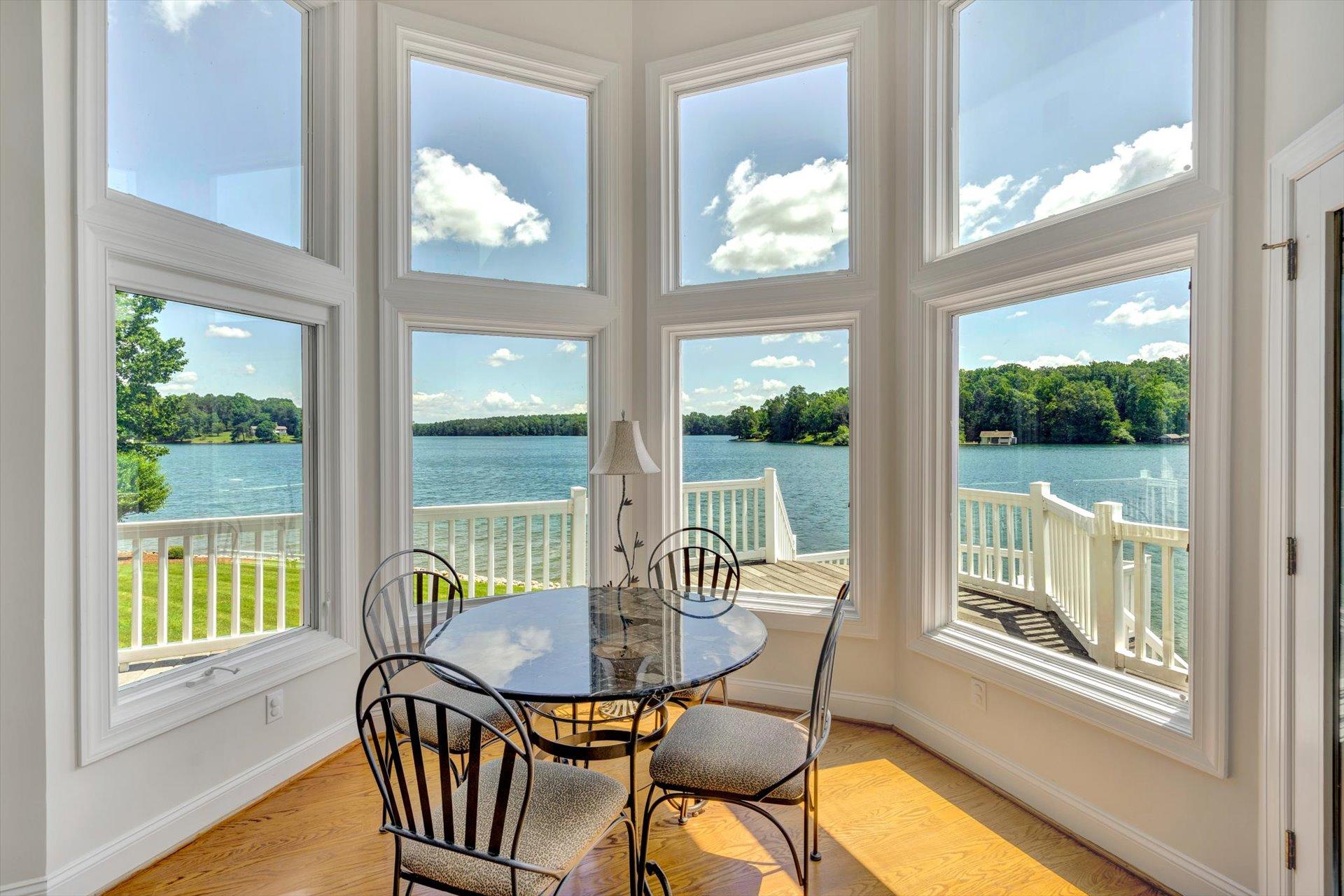 910 Somerset Cove Road Union Hall, VA 24176 - Photo 18 of 84 a view of a room with furniture wooden floor and outside view