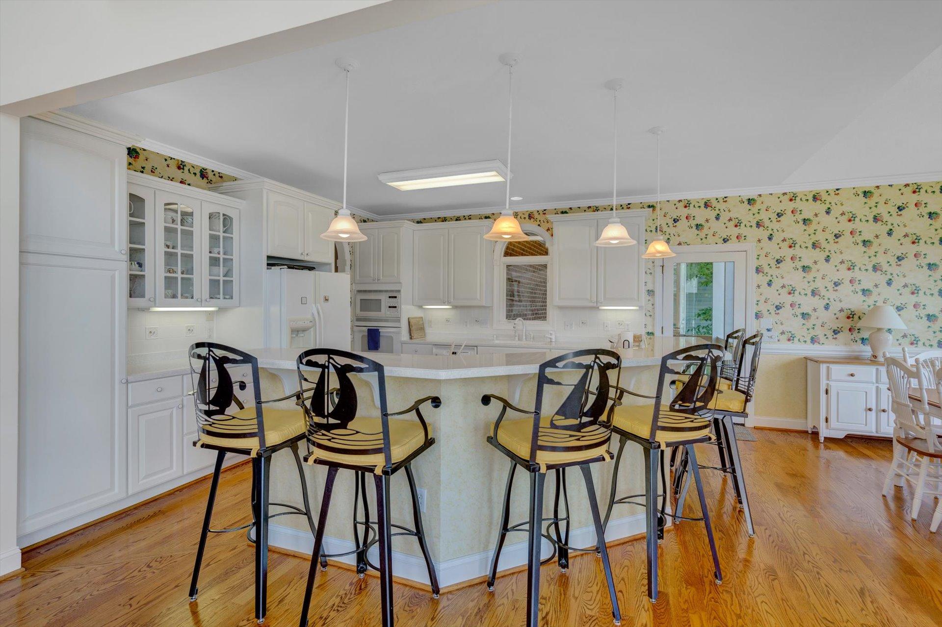 910 Somerset Cove Road Union Hall, VA 24176 - Photo 23 of 84 a dining room with furniture and wooden floor