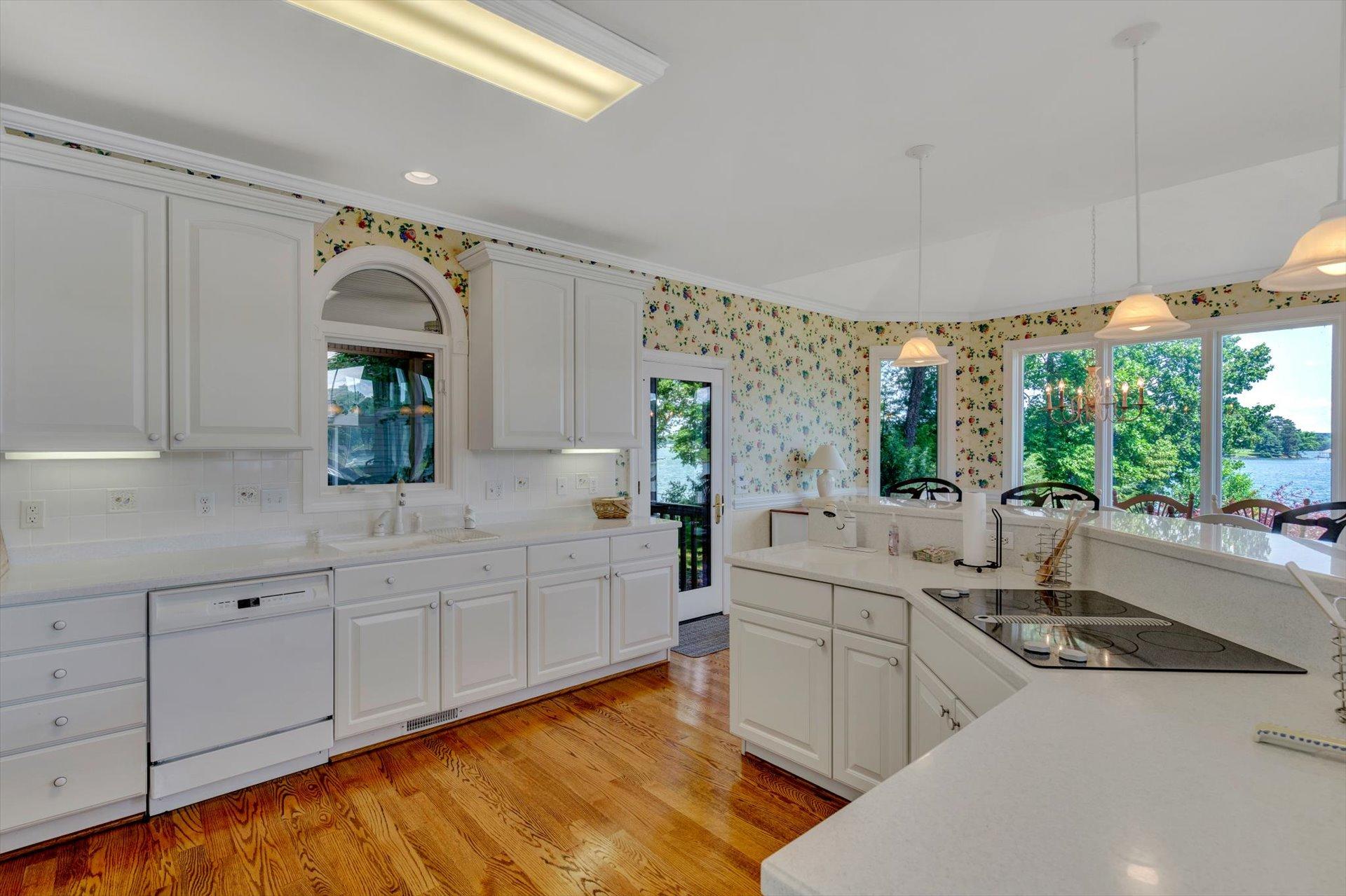 910 Somerset Cove Road Union Hall, VA 24176 - Photo 24 of 84 a kitchen with sink cabinets and window