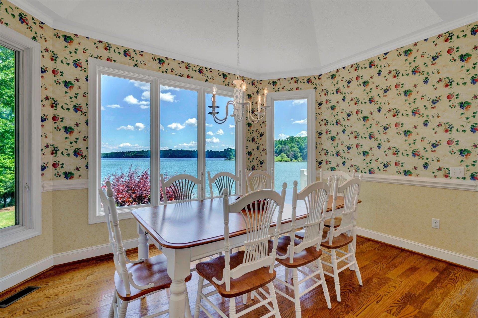 910 Somerset Cove Road Union Hall, VA 24176 - Photo 29 of 84 a dining room with furniture and wooden floor