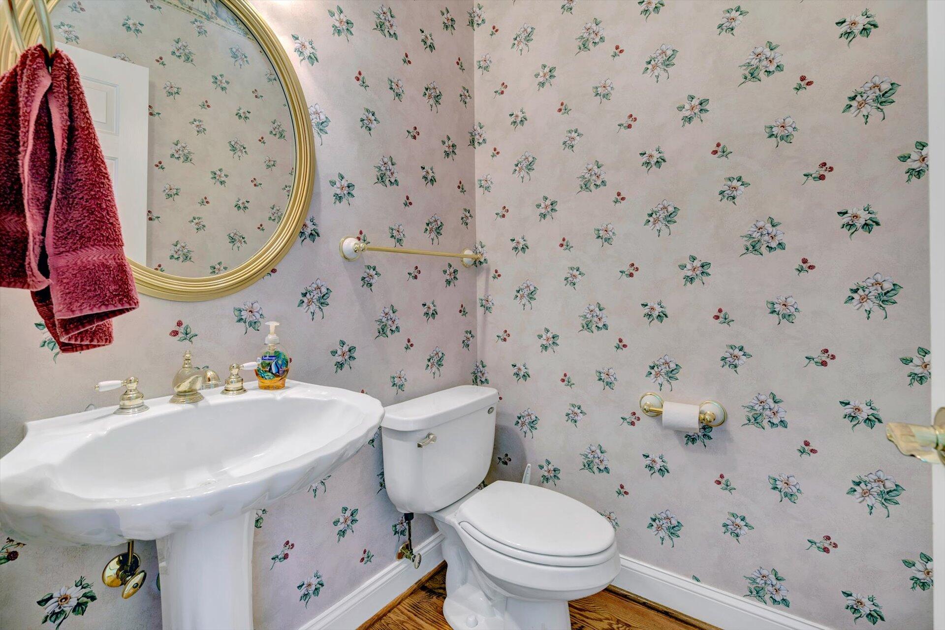 910 Somerset Cove Road Union Hall, VA 24176 - Photo 42 of 84 a bathroom with a sink a toilet and a mirror