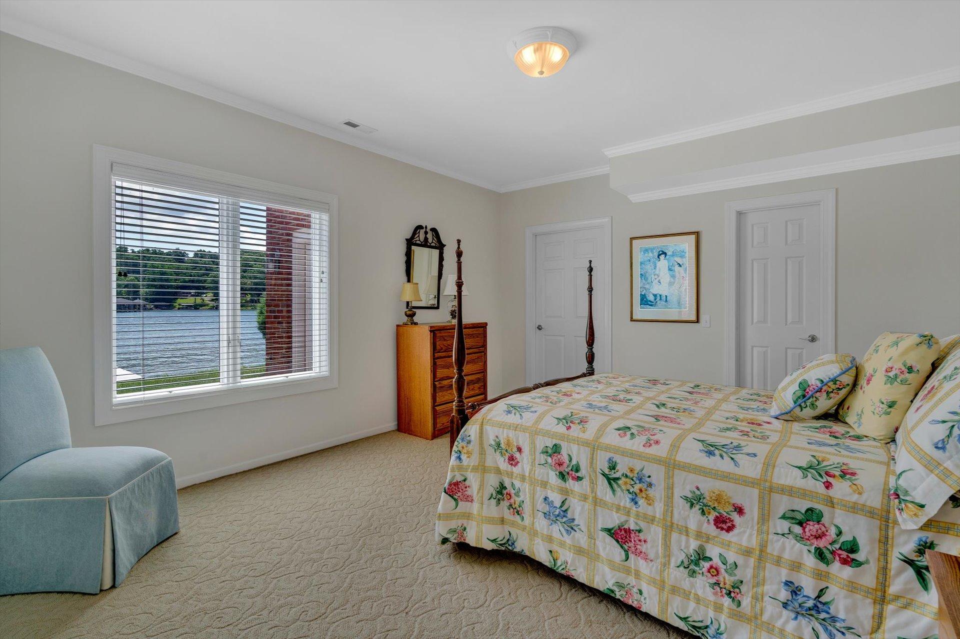 910 Somerset Cove Road Union Hall, VA 24176 - Photo 61 of 84 a bedroom with a bed and a couch
