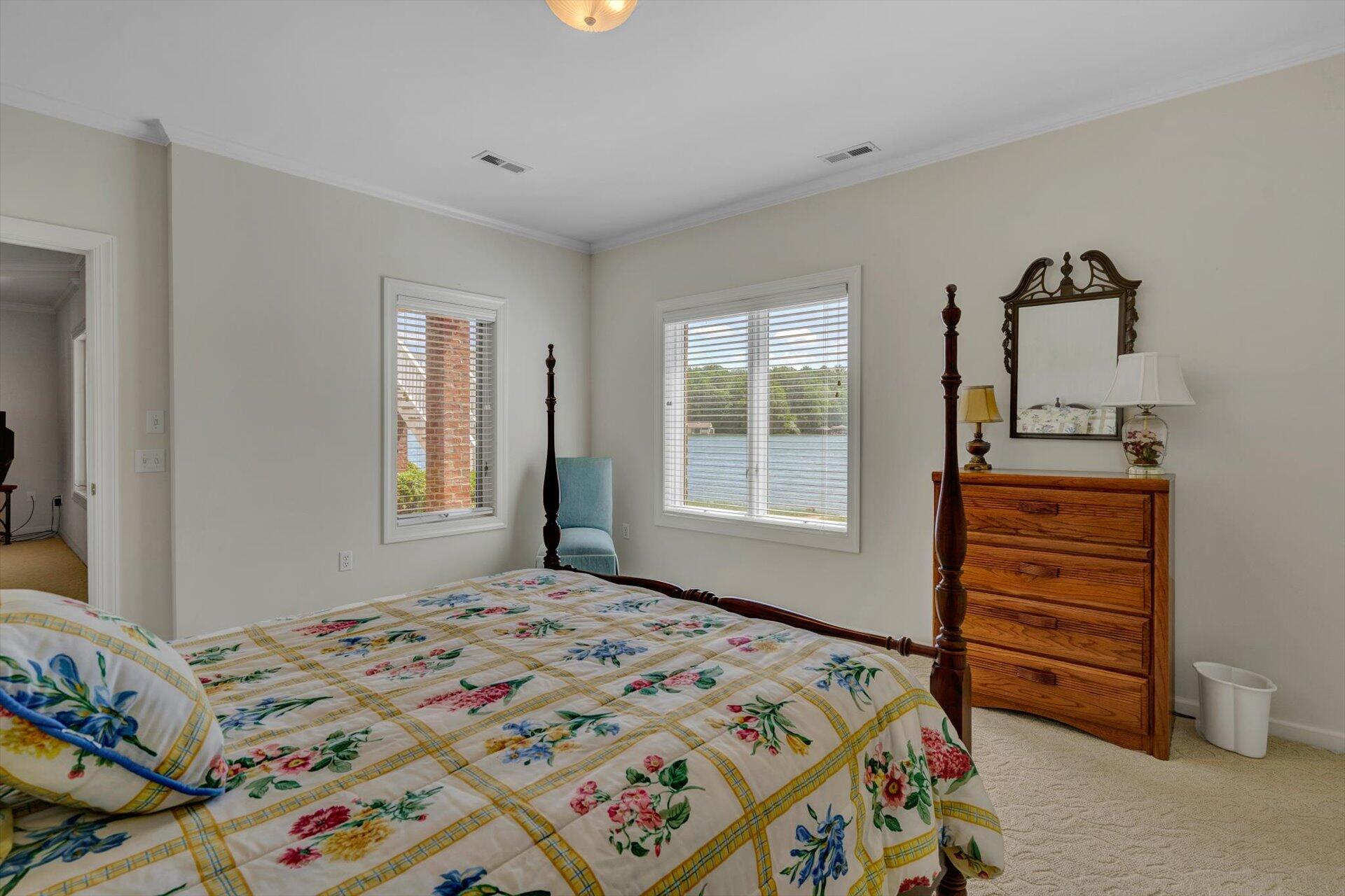 910 Somerset Cove Road Union Hall, VA 24176 - Photo 62 of 84 a bedroom with a bed and a window