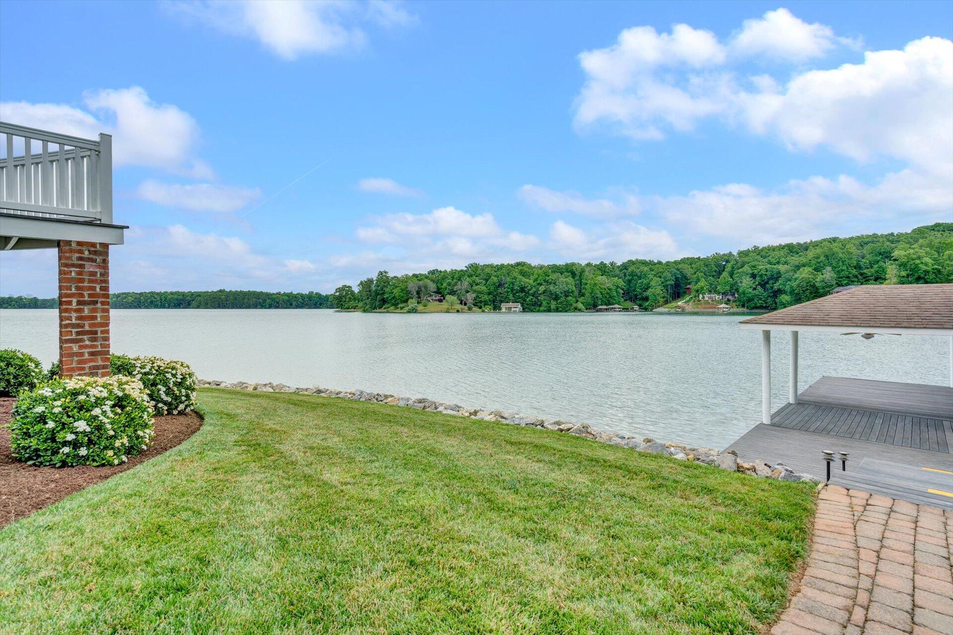 910 Somerset Cove Road Union Hall, VA 24176 - Photo 70 of 84 a view of a lake with houses in the back