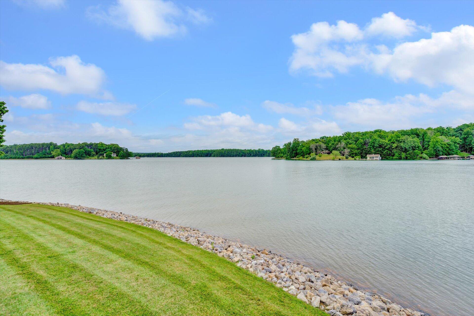 910 Somerset Cove Road Union Hall, VA 24176 - Photo 71 of 84 a view of a lake from a yard