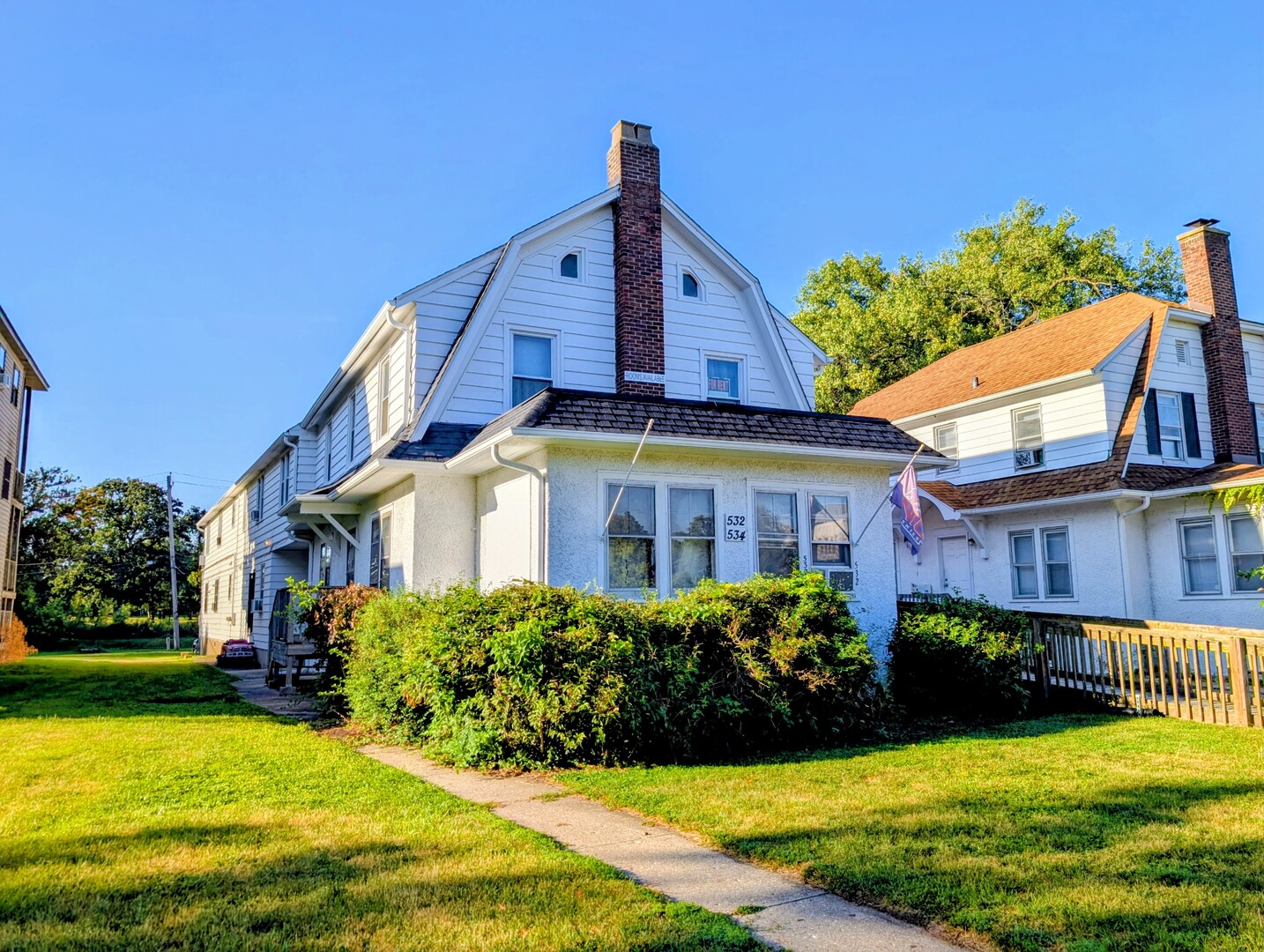 a front view of a house with swimming pool