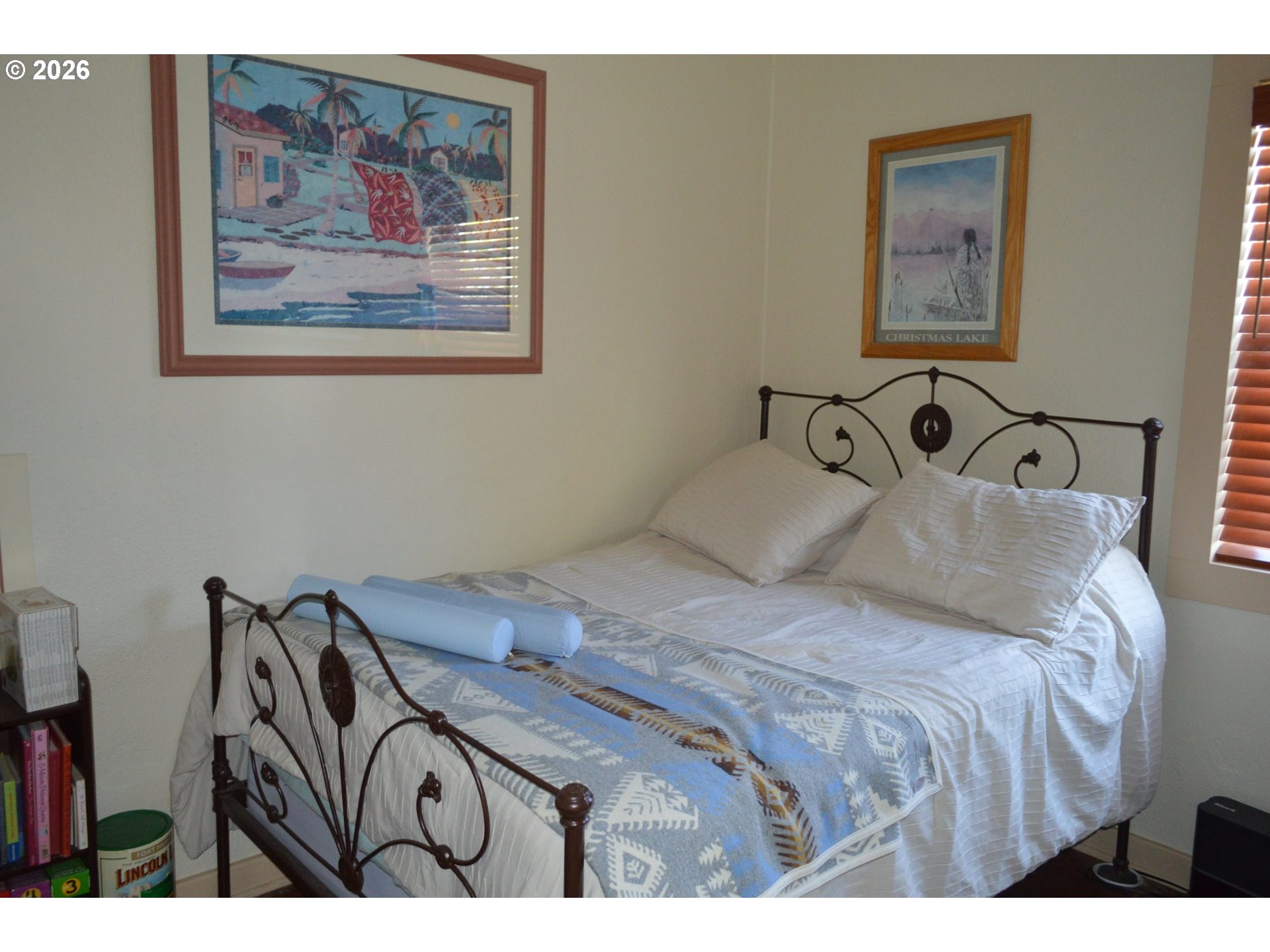 1935 Bench Road Vale, OR 97918 - Photo 15 of 25 a bedroom with a bed and painting on the wall