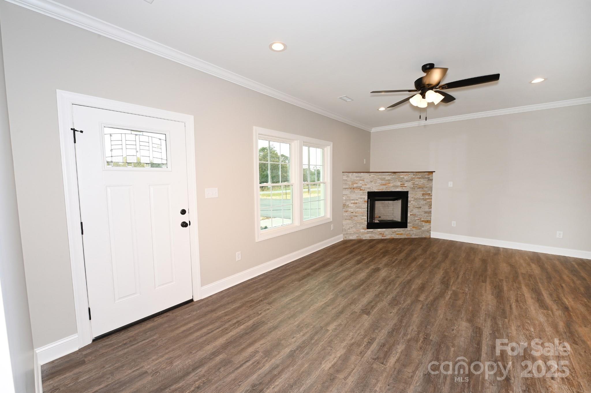 3835 Sulphur Springs Road Northeast Hickory, NC 28601 - Photo 4 of 44 wooden floor in an empty room with a window