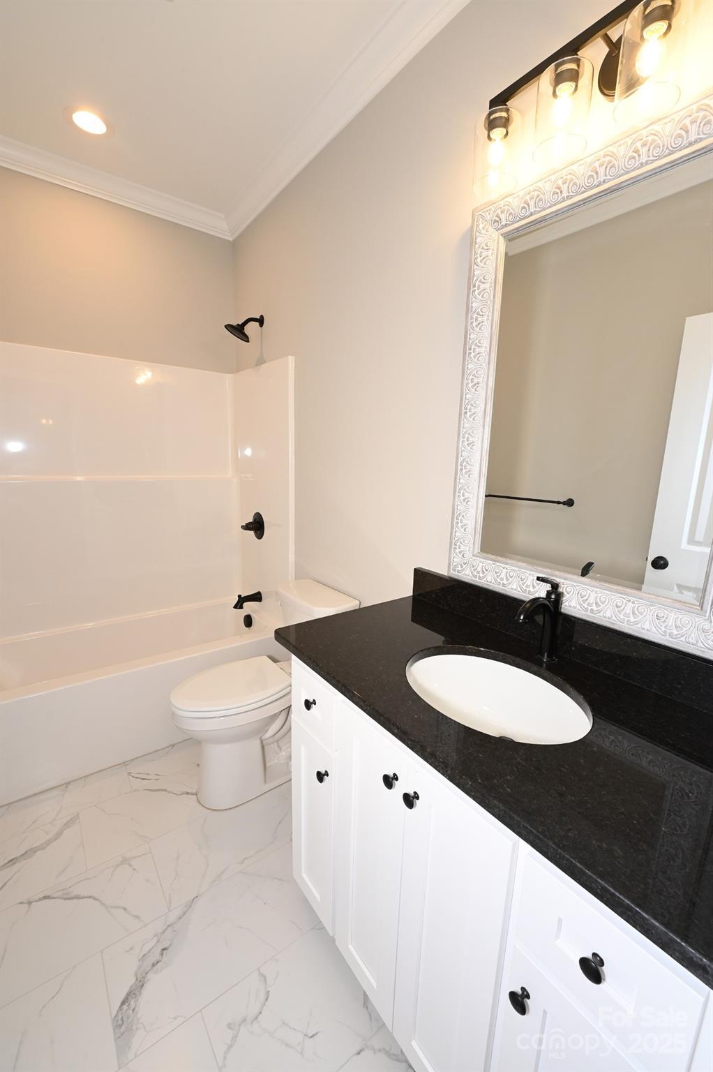 3835 Sulphur Springs Road Northeast Hickory, NC 28601 - Photo 41 of 44 a bathroom with a granite countertop sink and a mirror