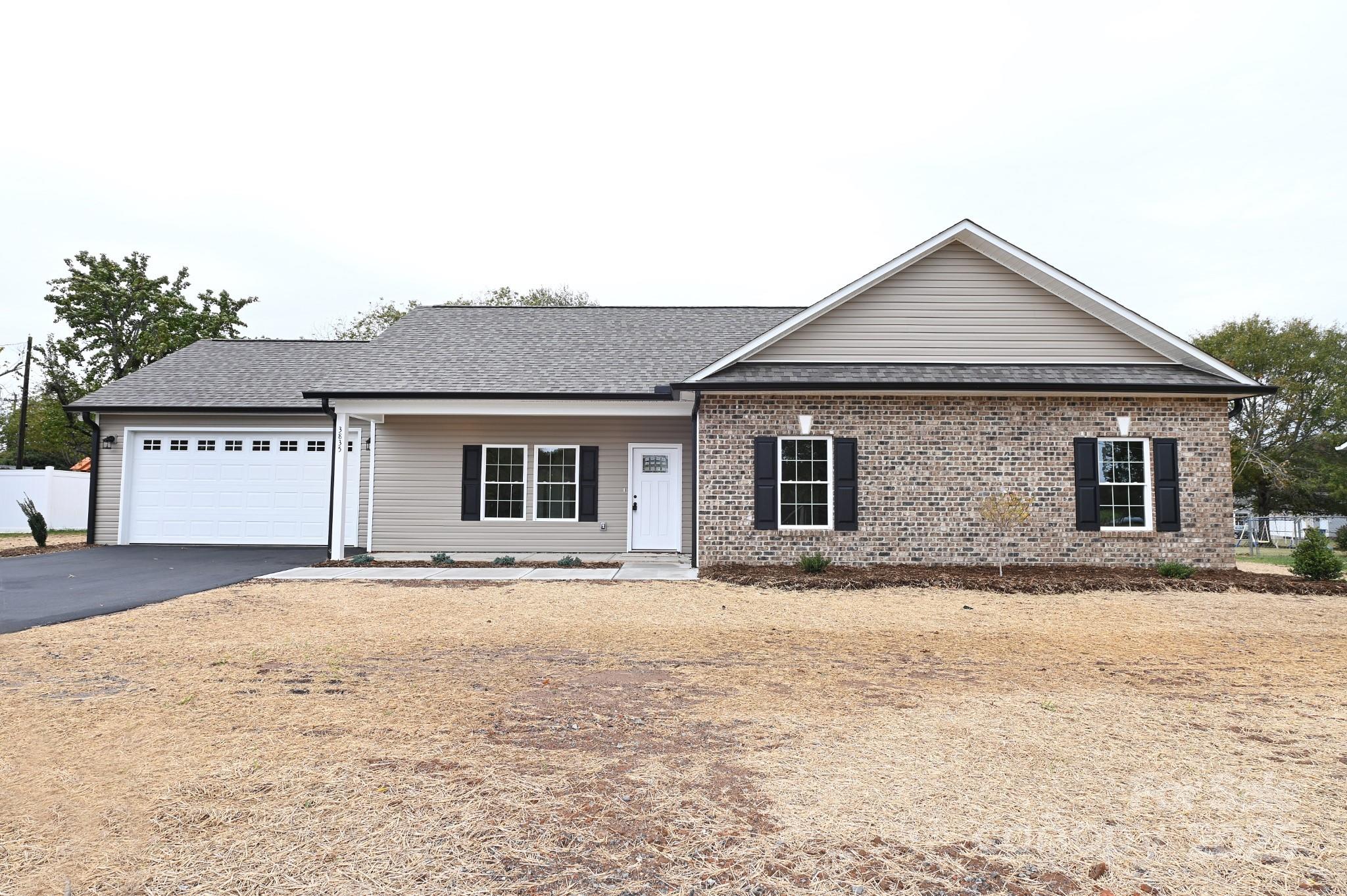 3835 Sulphur Springs Road Northeast Hickory, NC 28601 - Photo 44 of 44 a front view of a house with a yard