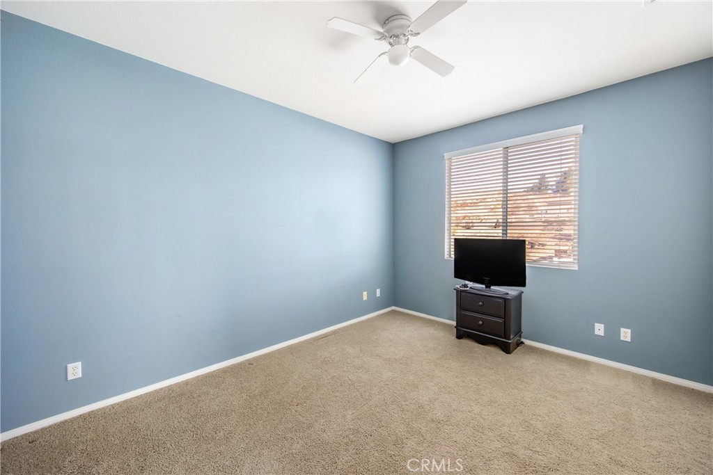 18936 Malkoha Street Perris, CA 92570 - Photo 38 of 70 a view of room with workspace and a window