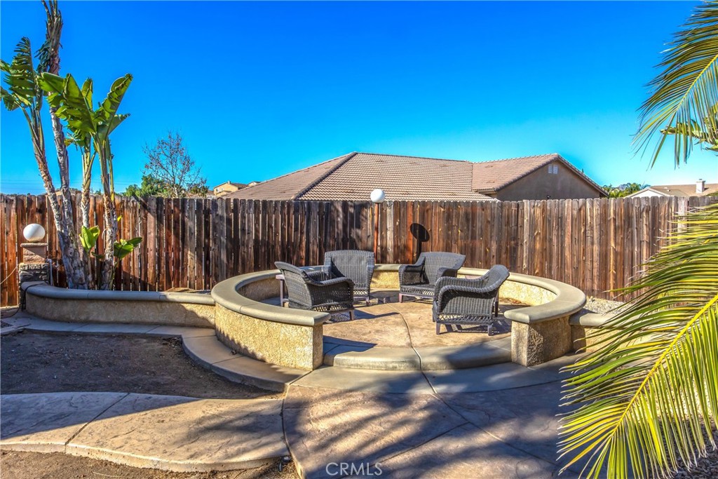 18936 Malkoha Street Perris, CA 92570 - Photo 60 of 70 a view of a table and chairs in patio