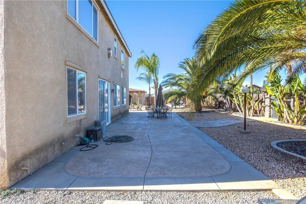 18936 Malkoha Street Perris, CA 92570 - Photo 65 of 70 a view of a yard in front of a house