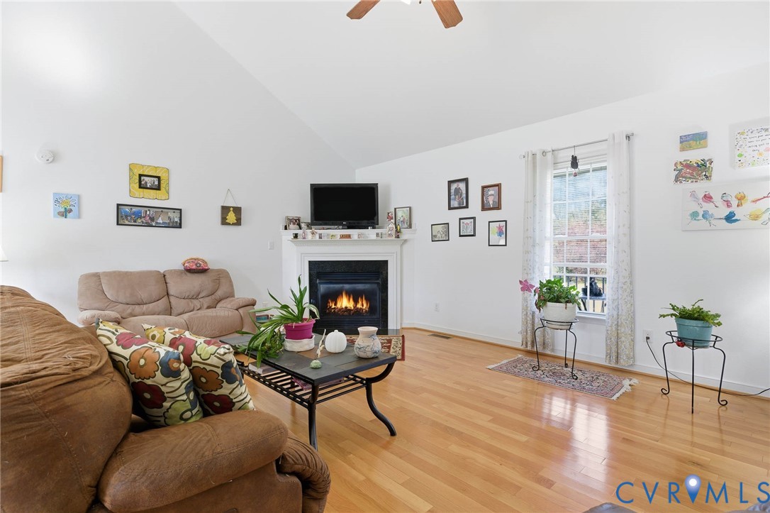 15900 Nobles Road Disputanta, VA 23842 - Photo 5 of 36 Living room with light hardwood finished floors, a