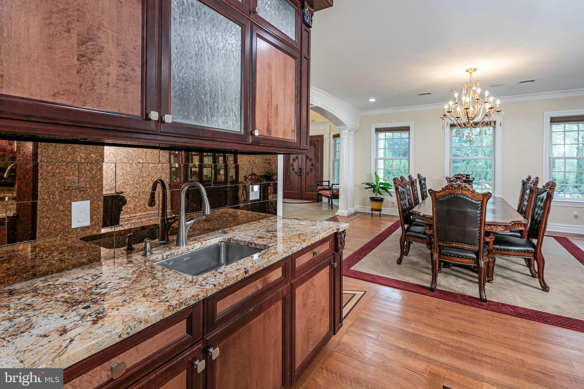 3870 Princeton Pike Lawrenceville, NJ 08648 - Photo 15 of 57 a kitchen with granite countertop lots of counter top space and dining table