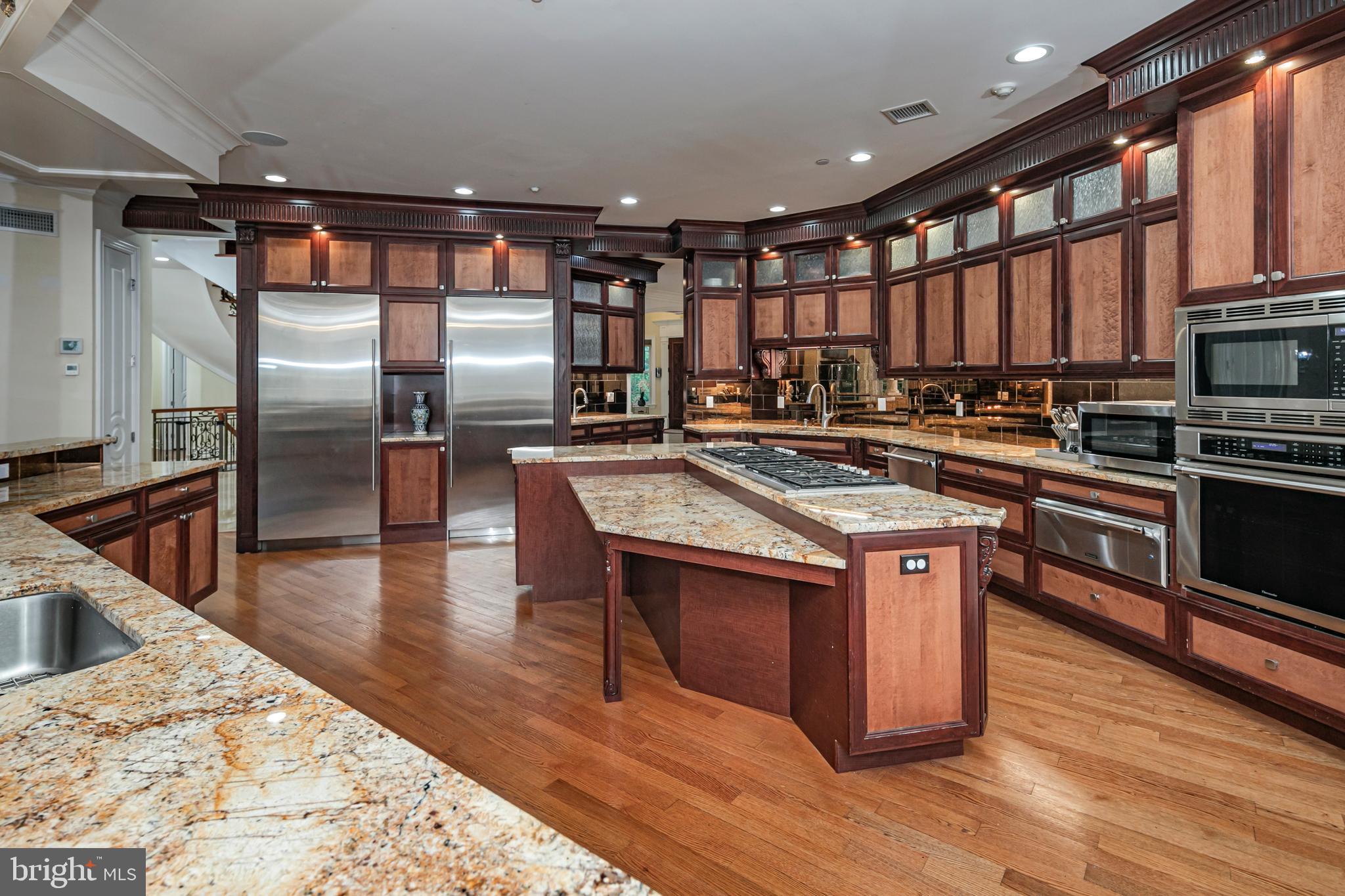 3870 Princeton Pike Lawrenceville, NJ 08648 - Photo 21 of 57 a kitchen with stainless steel appliances granite countertop a stove a sink and a refrigerator