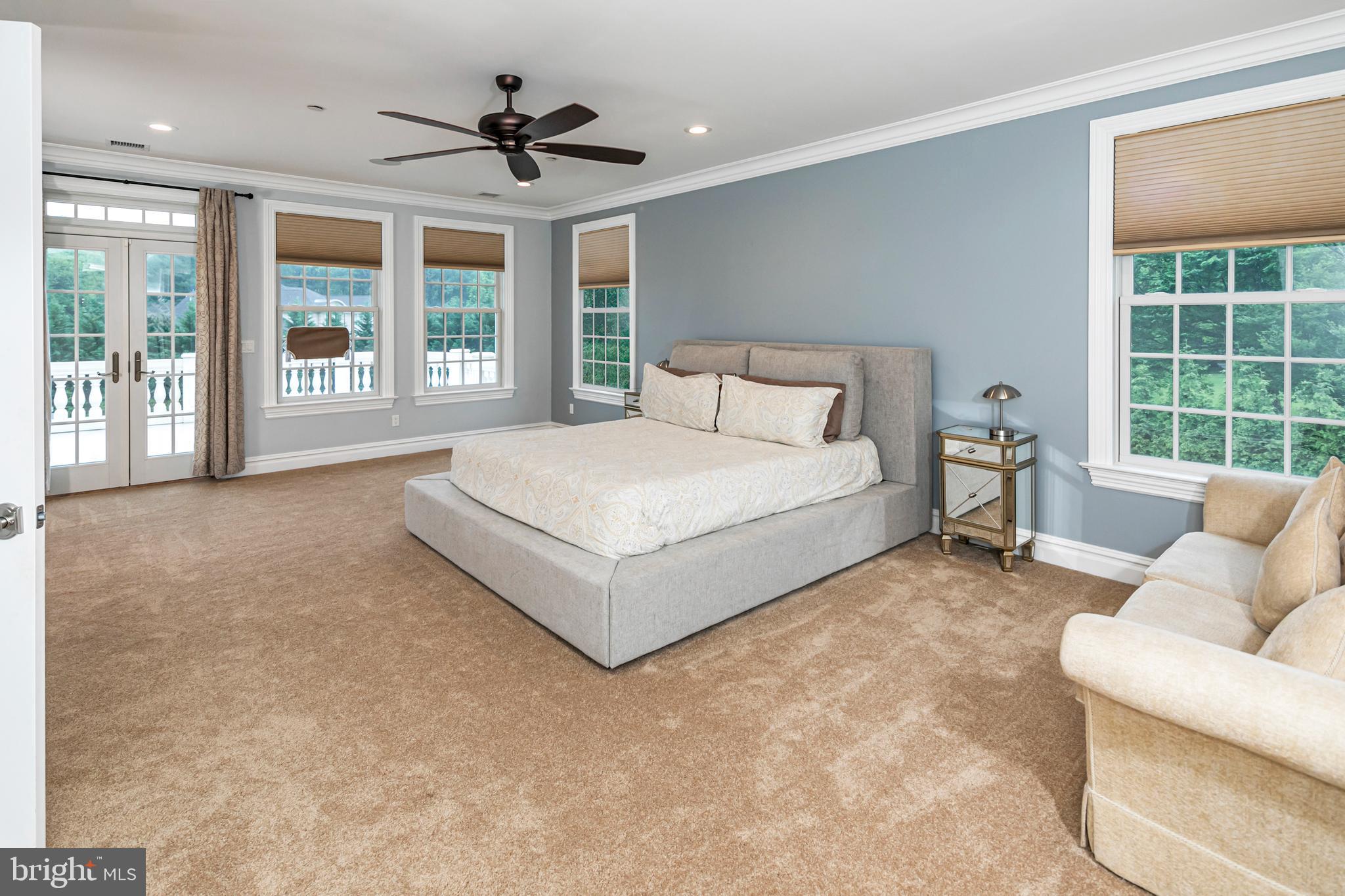 3870 Princeton Pike Lawrenceville, NJ 08648 - Photo 29 of 57 a spacious bedroom with a bed and glass window