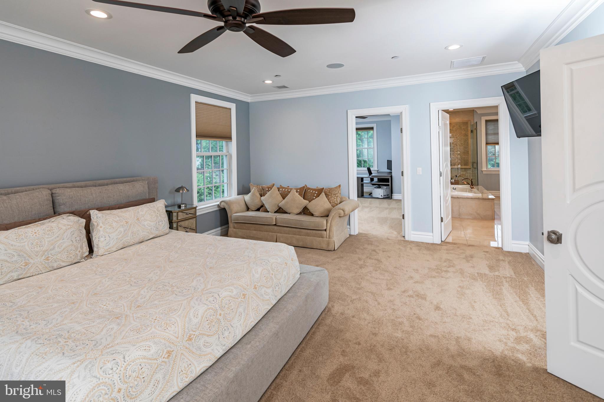 3870 Princeton Pike Lawrenceville, NJ 08648 - Photo 31 of 57 a spacious bedroom with a bed couch and window