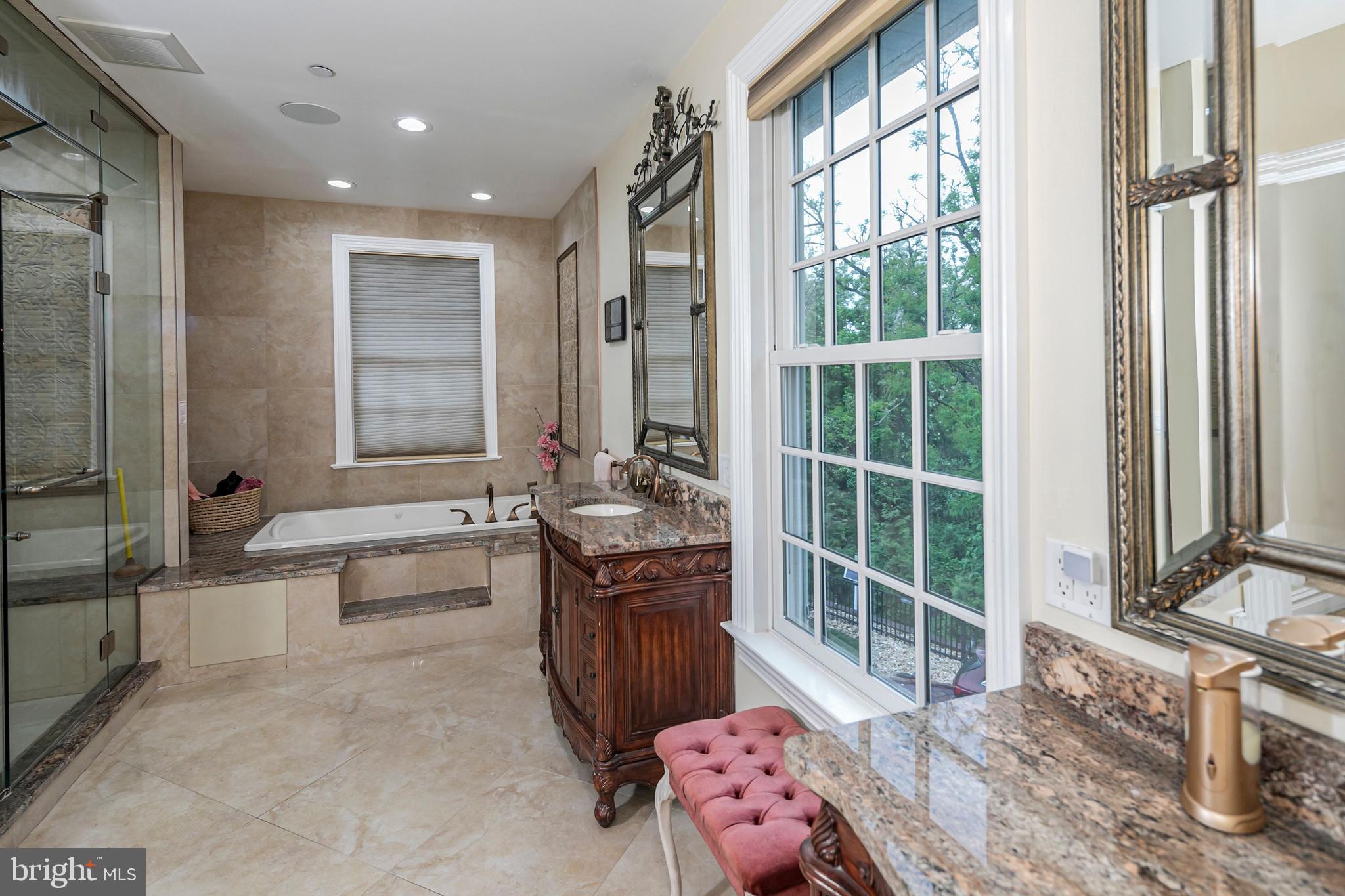 3870 Princeton Pike Lawrenceville, NJ 08648 - Photo 36 of 57 a spacious bathroom with a tub sink and shower