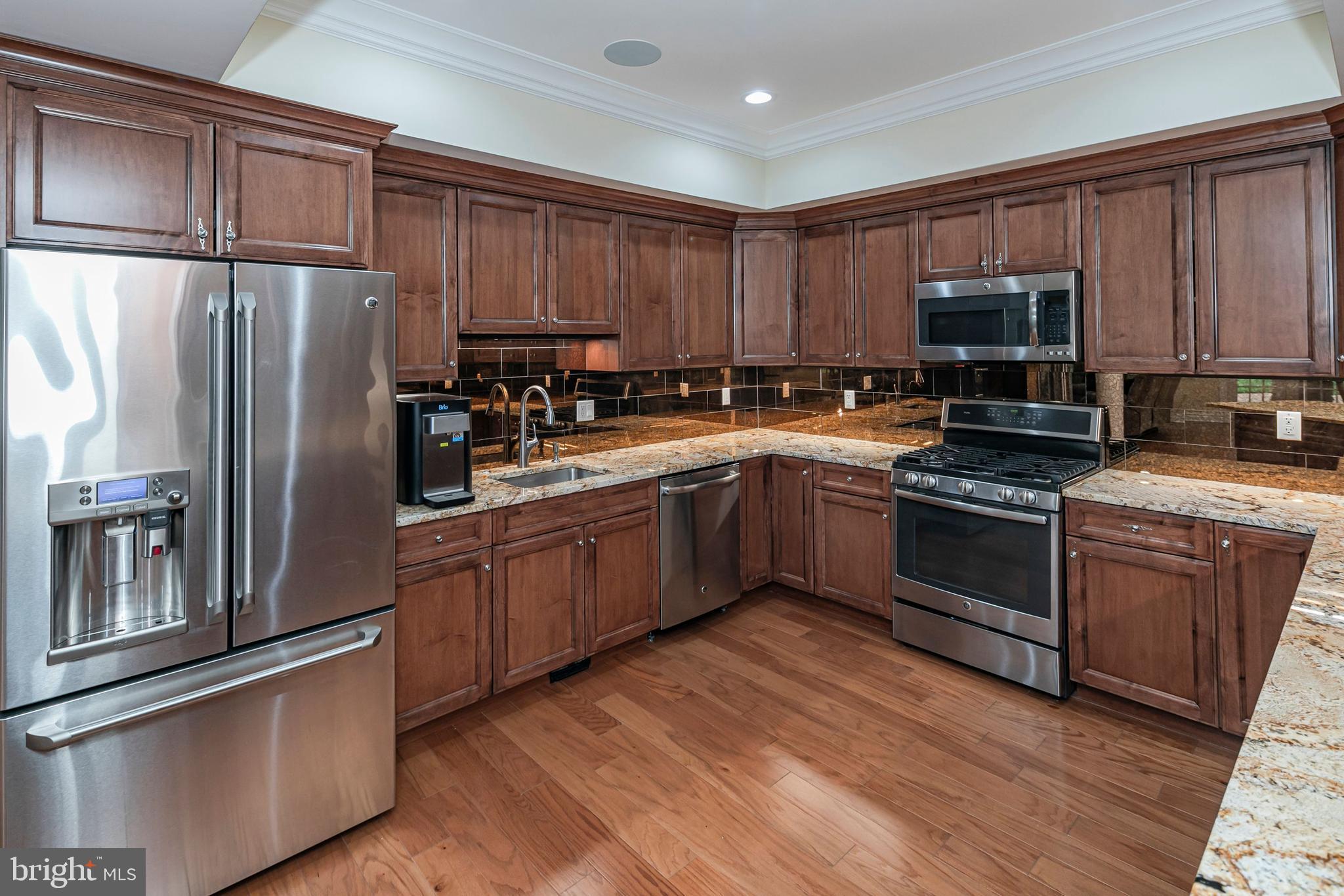 3870 Princeton Pike Lawrenceville, NJ 08648 - Photo 44 of 57 a kitchen with a sink stainless steel appliances and cabinets