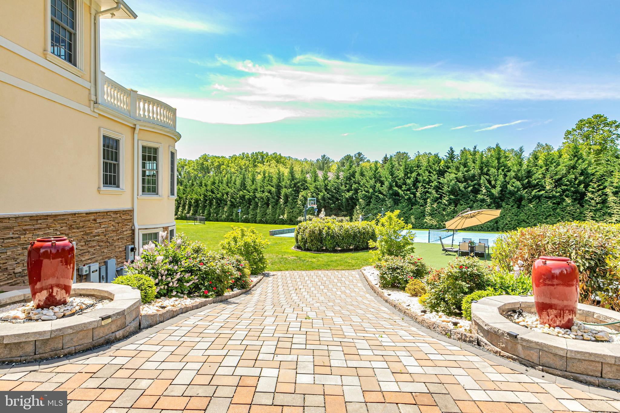 3870 Princeton Pike Lawrenceville, NJ 08648 - Photo 50 of 57 a front view of a house with a yard and outdoor seating