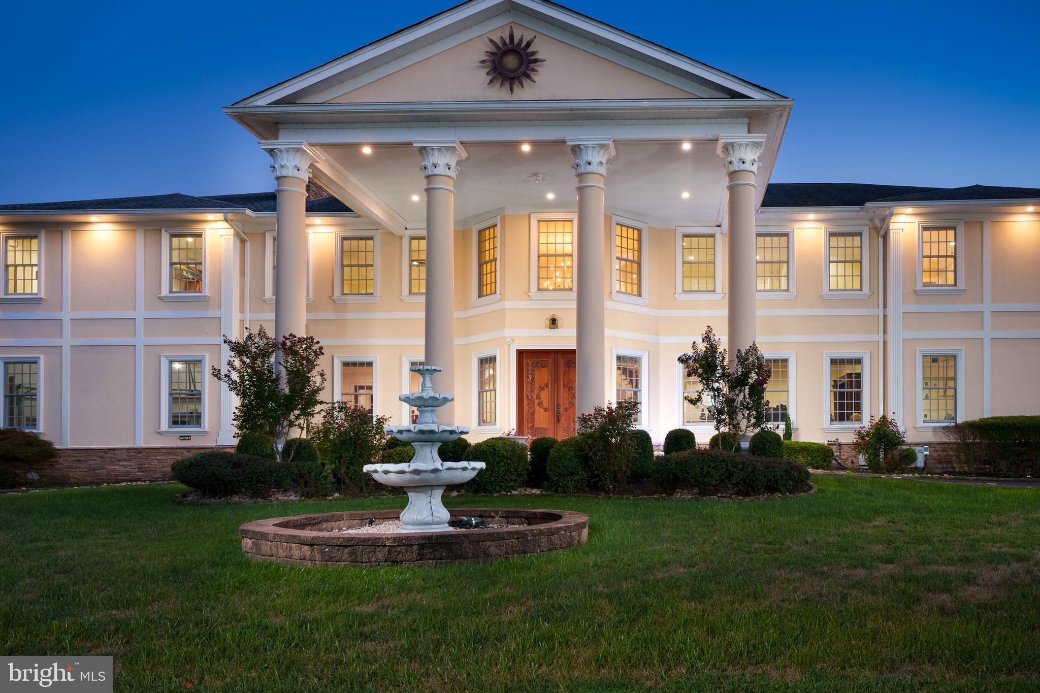 3870 Princeton Pike Lawrenceville, NJ 08648 - Photo 6 of 57 a front view of a house with a yard