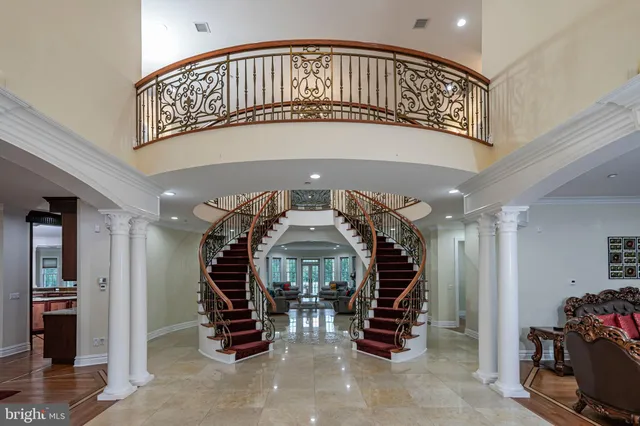 a living room with furniture rug and window