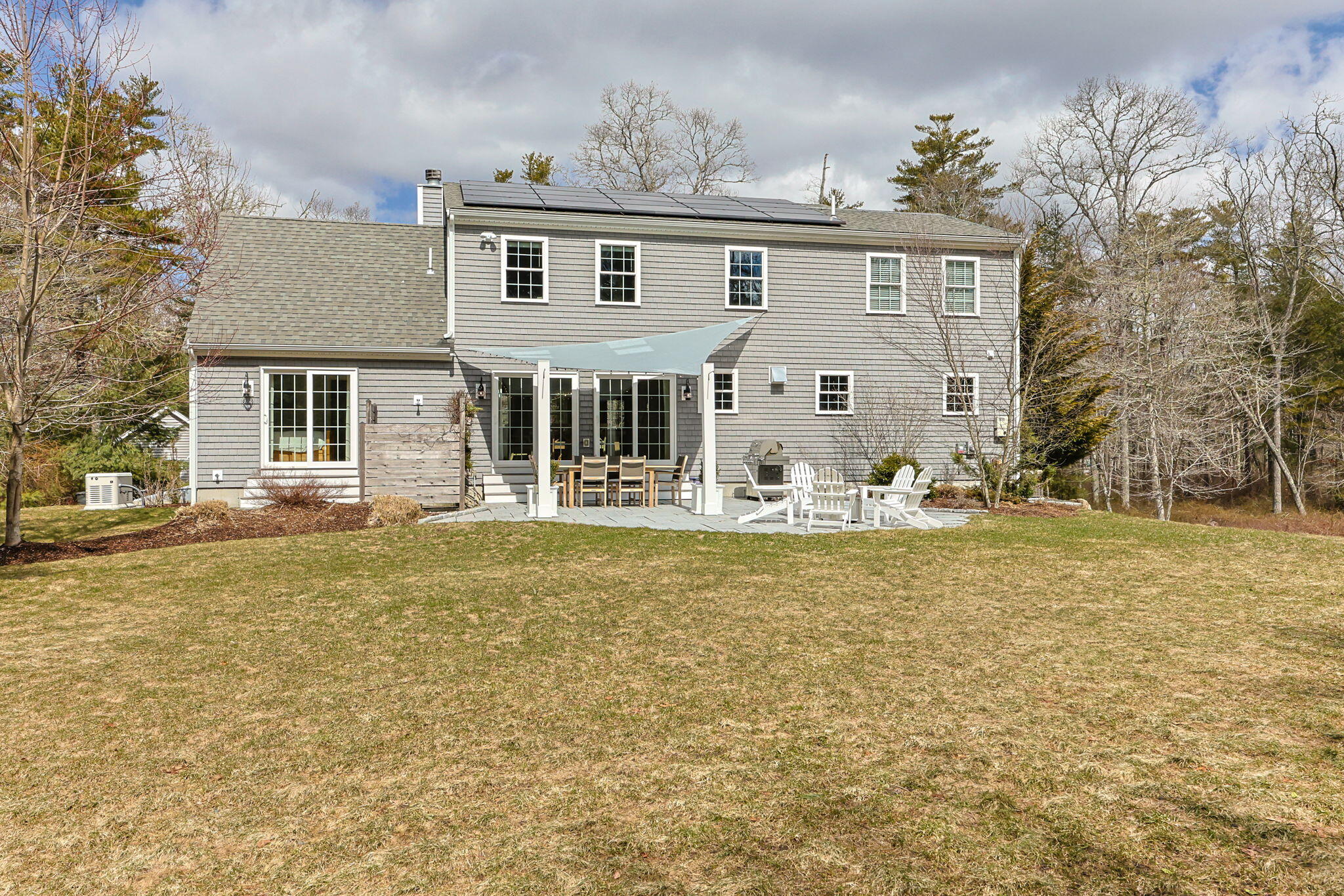 174 Cross Neck Road Marion, MA 02738 - Photo 33 of 41 a front view of a house with garden