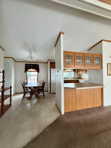 a kitchen with stainless steel appliances granite countertop a sink and cabinets