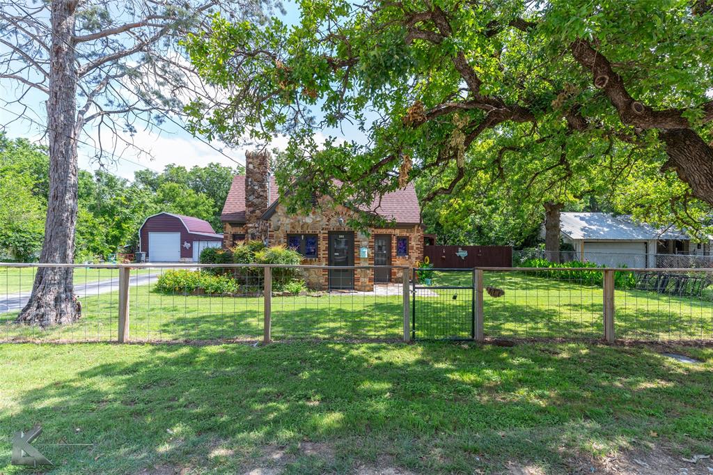 202 East Ross Street Rising Star, TX 76471 - Photo 4 of 40 a view of house with backyard
