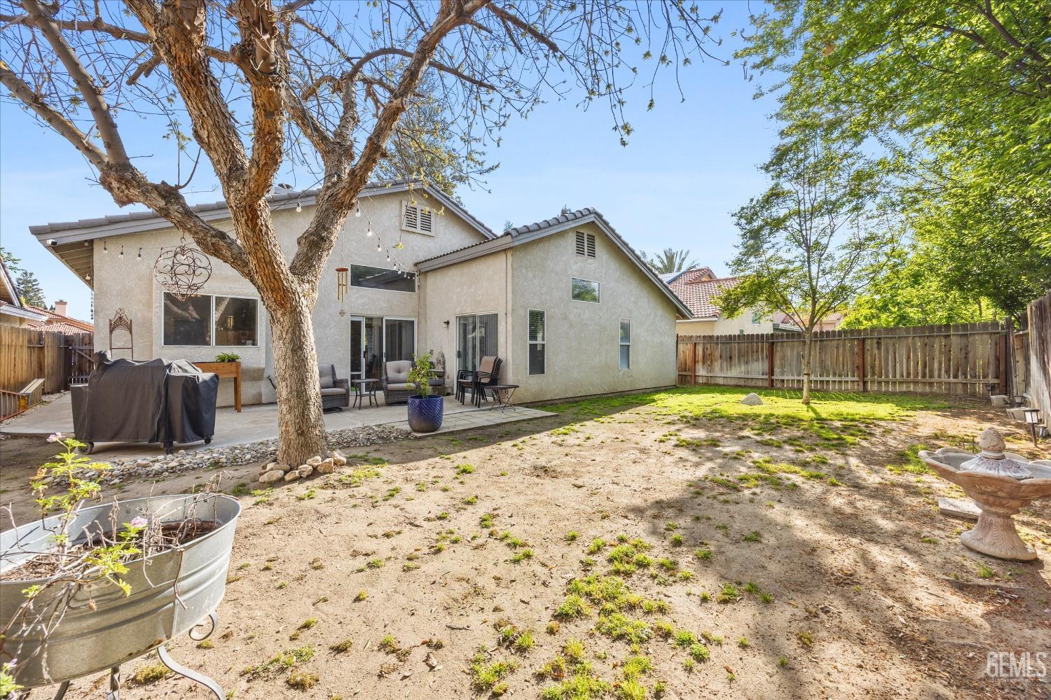 Undisclosed Address Bakersfield, CA 93312 - Photo 30 of 31 a view of a house with wooden fence