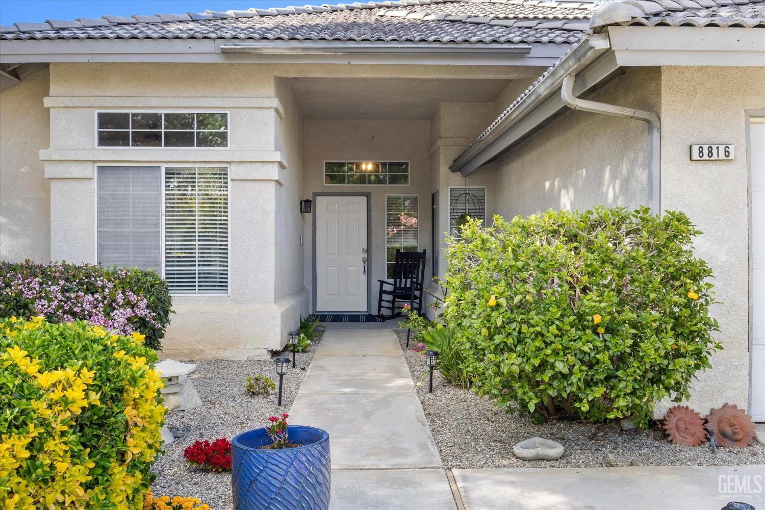 Undisclosed Address Bakersfield, CA 93312 - Photo 4 of 31 a front view of a house