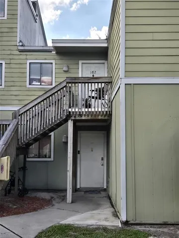 a view of balcony with a door