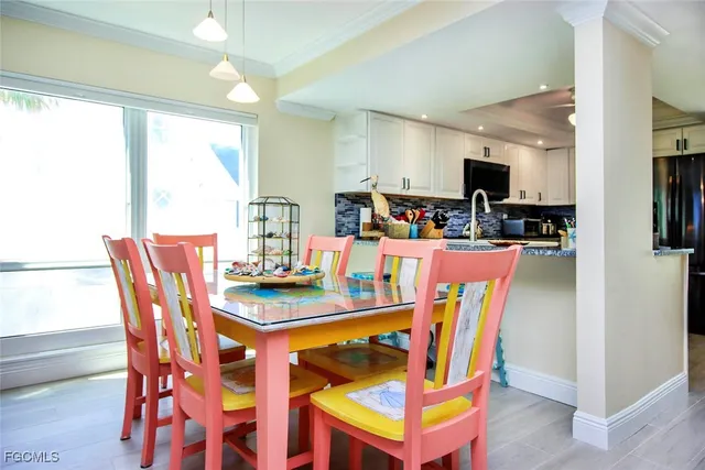 a view of a dining room with furniture