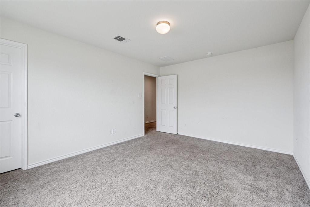 2712 Ryder Lane Aubrey, TX 76227 - Photo 19 of 26 a view of an empty room