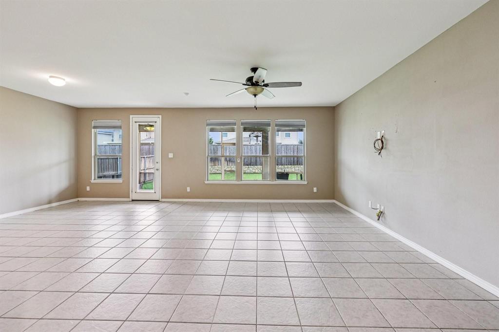 2712 Ryder Lane Aubrey, TX 76227 - Photo 6 of 26 a view of an empty room with a window