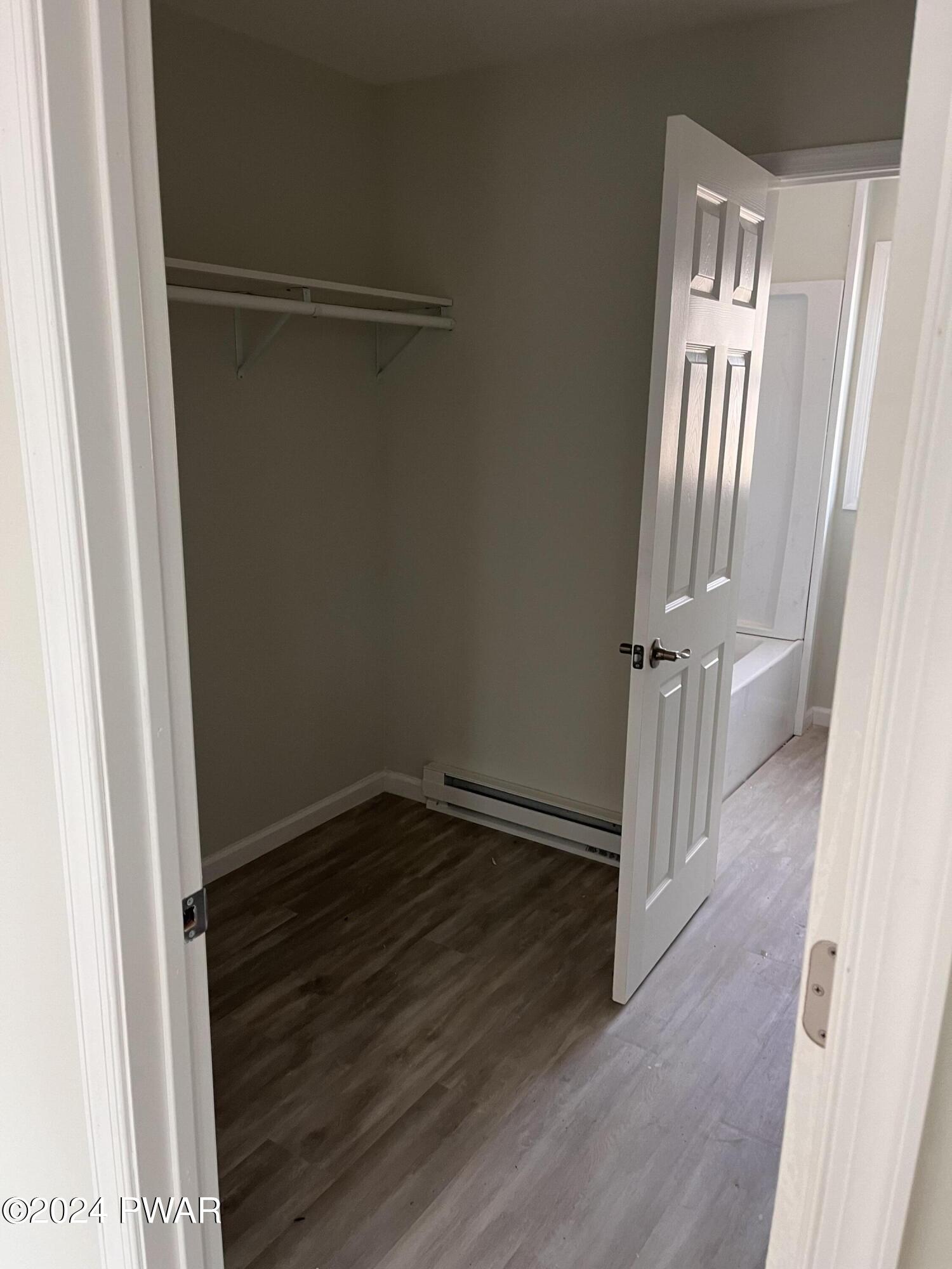 128 Stonehenge Road Milford, PA 18337 - Photo 14 of 14 a view of empty room with wooden floor
