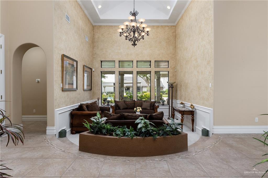 2116 West Alberta Road Edinburg, TX 78539 - Photo 4 of 35 Intimate formal living room with fabulous natural light and views to the lush pool area