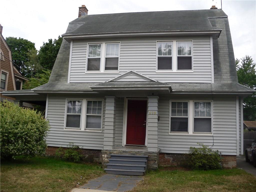 219 Fountain Street Springfield, MA 01108 - Photo 1 of 1 a front view of a house with garden