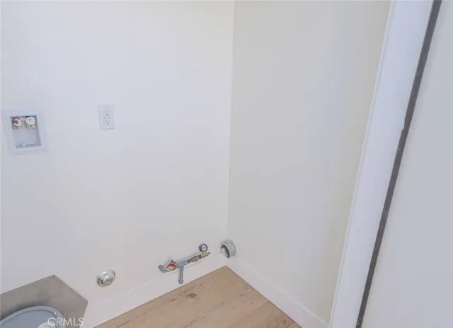 a view of an entryway with a hallway