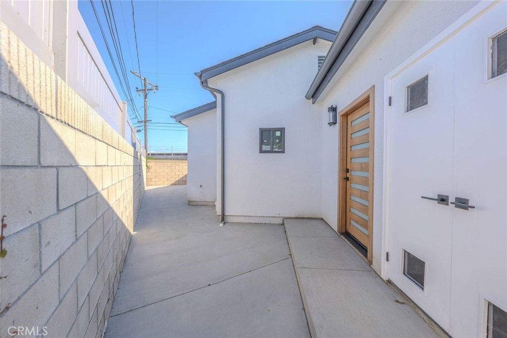 5825 View Circle Huntington Beach, CA 92649 - Photo 25 of 28 a view of an entryway with a hallway